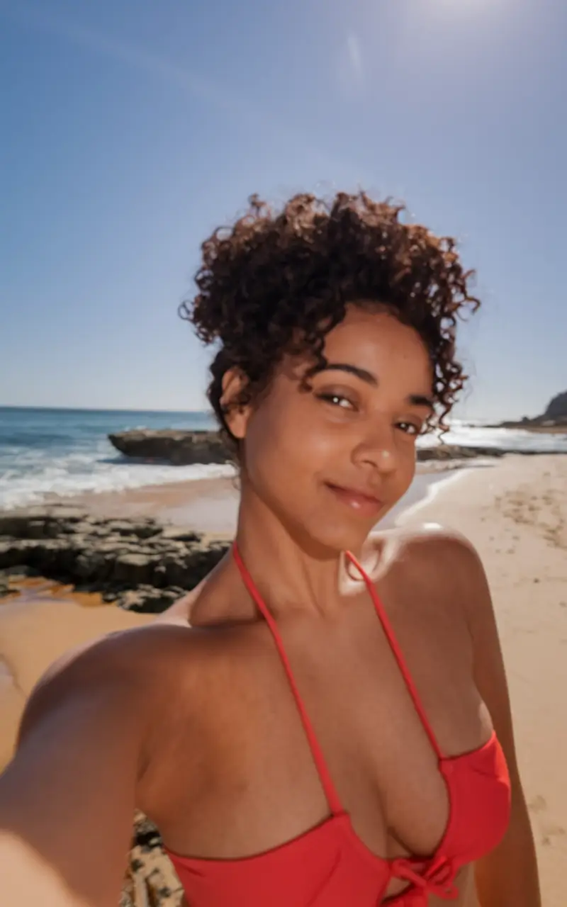 Fresh Swimming Hairstyles for Summer 2025 Curly High Pineapple Puff