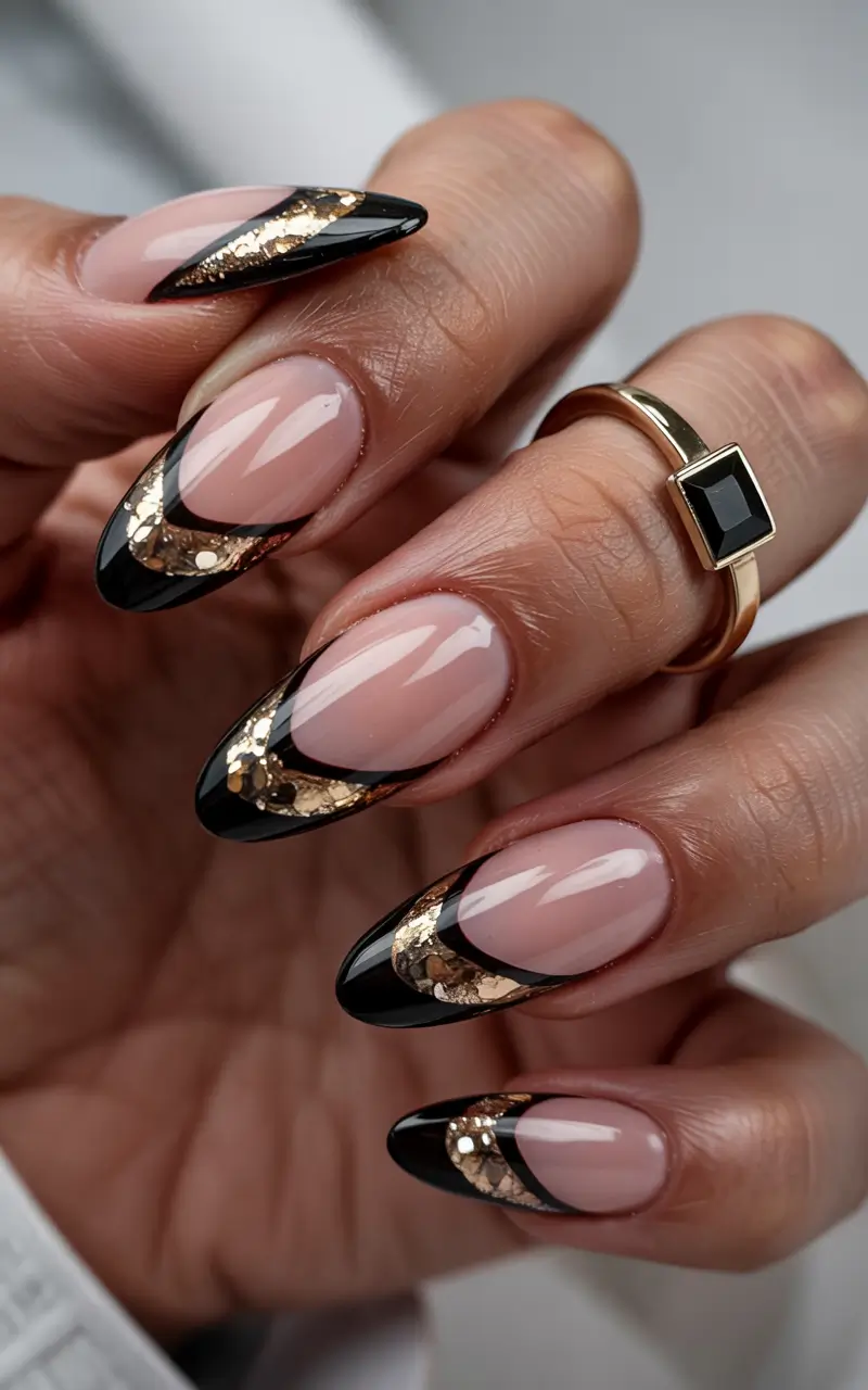 Almond Nail Inspo for a Cute Summer 2025 Look Elegant Contrast with Black and Gold Foil