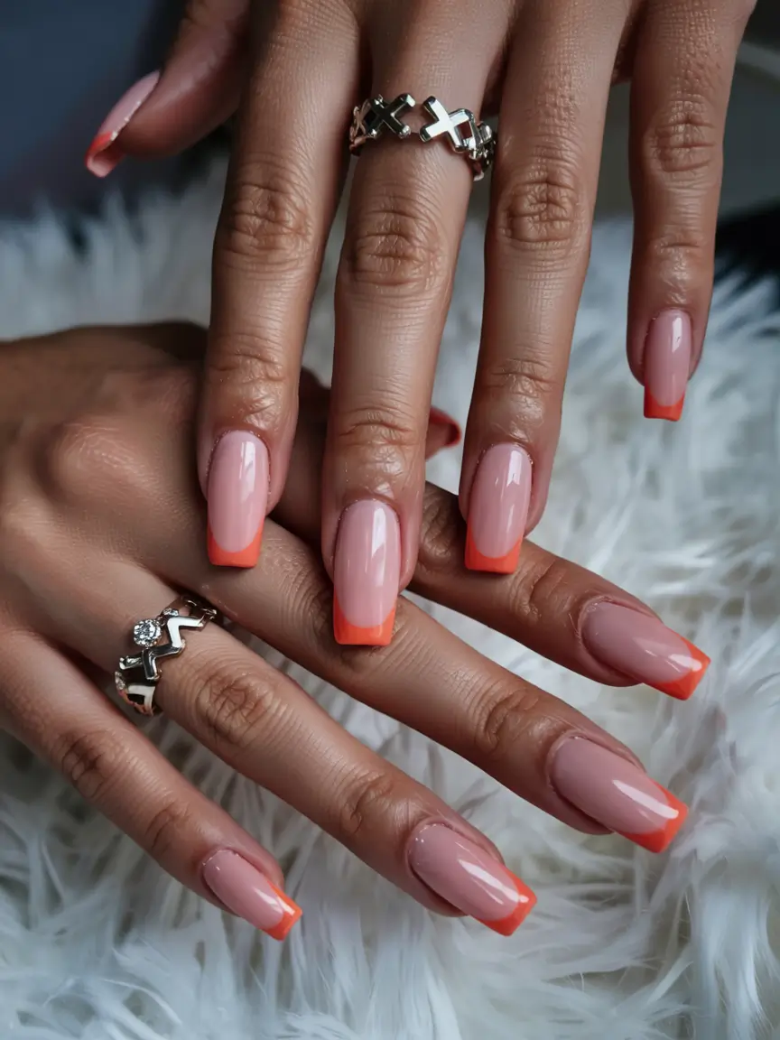 basic summer nails ideas 2025 Tangerine French for a Sunlit Mood
