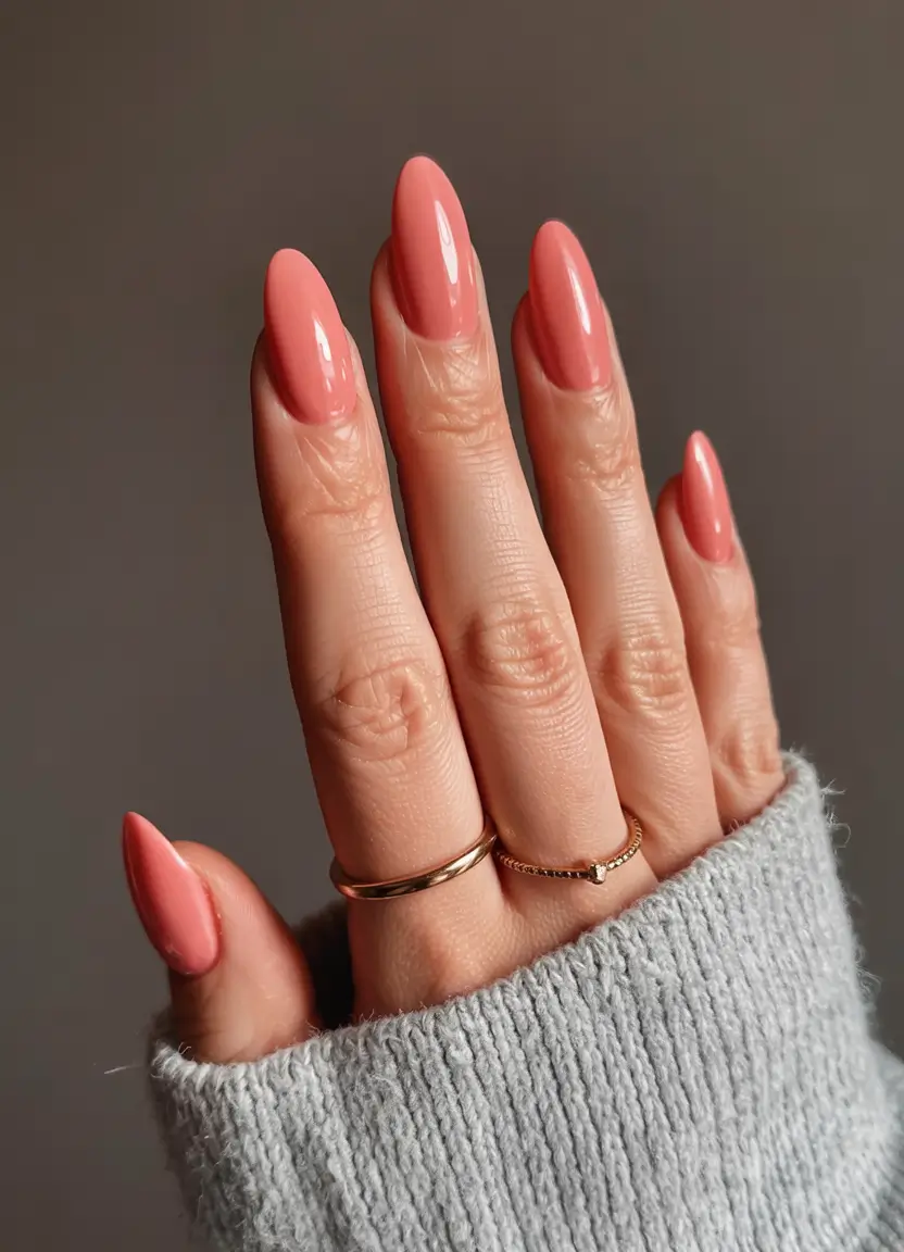 best june nail colors for 2025 Rosy Coral Gloss on Classic Almond