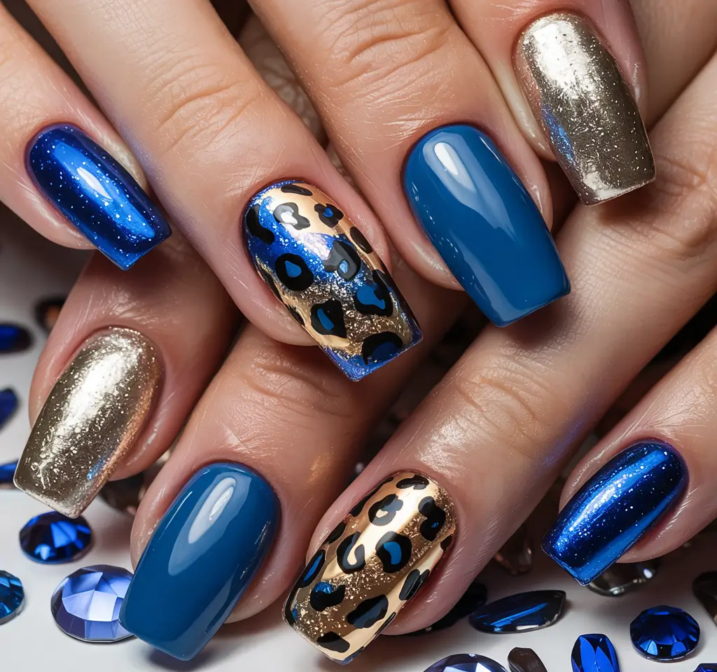 cool blue nail ideas for summer 2025 Metallic Leopard Meets Royal Sparkle