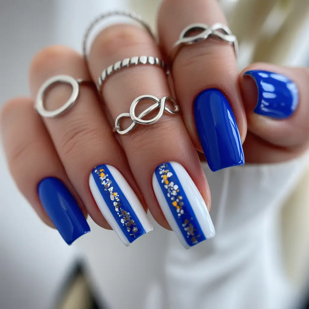 cool blue nail ideas for summer 2025 Modern Sapphire Elegance with Foil Detail