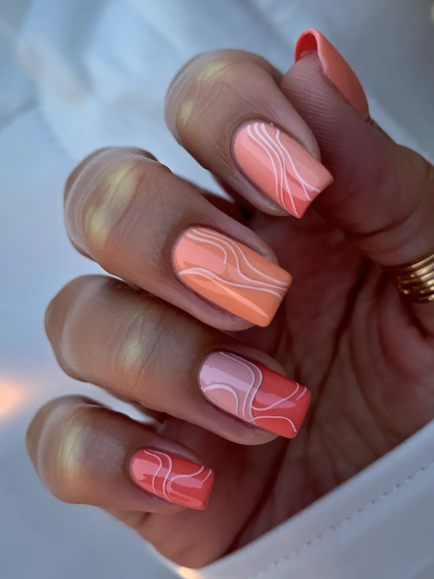 nail inspo for summer 2025 Sunset Peach Swirls