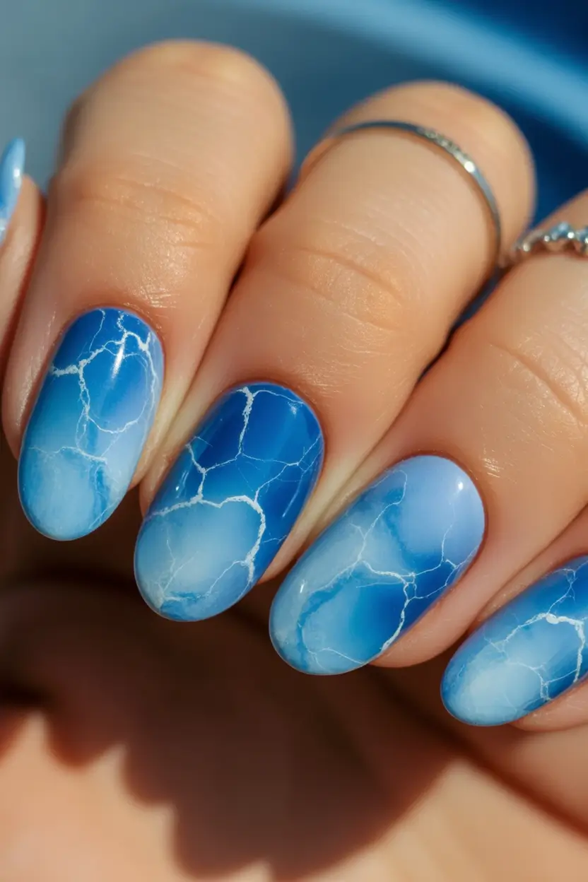 oval nail looks for summer 2025+Ocean Marble Blues
