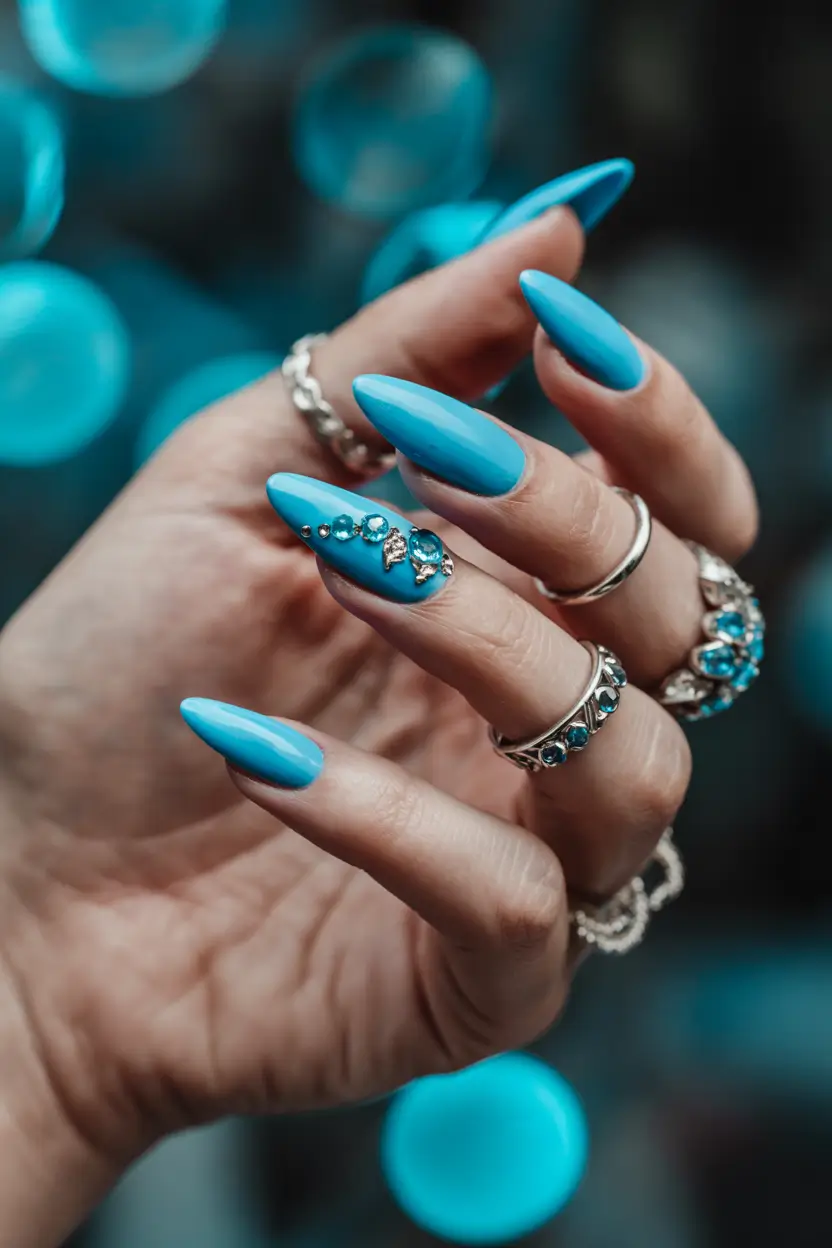 summer acrylic nail ideas 2025 Ocean-Toned Elegance with a Rhinestone Kiss